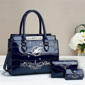 Buy the Handbag, Get the Wallet & Card Holder Free Miami Dolphins VITRHB110